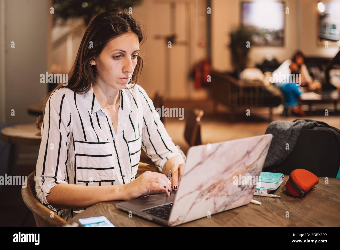 Woman researching on her laptop