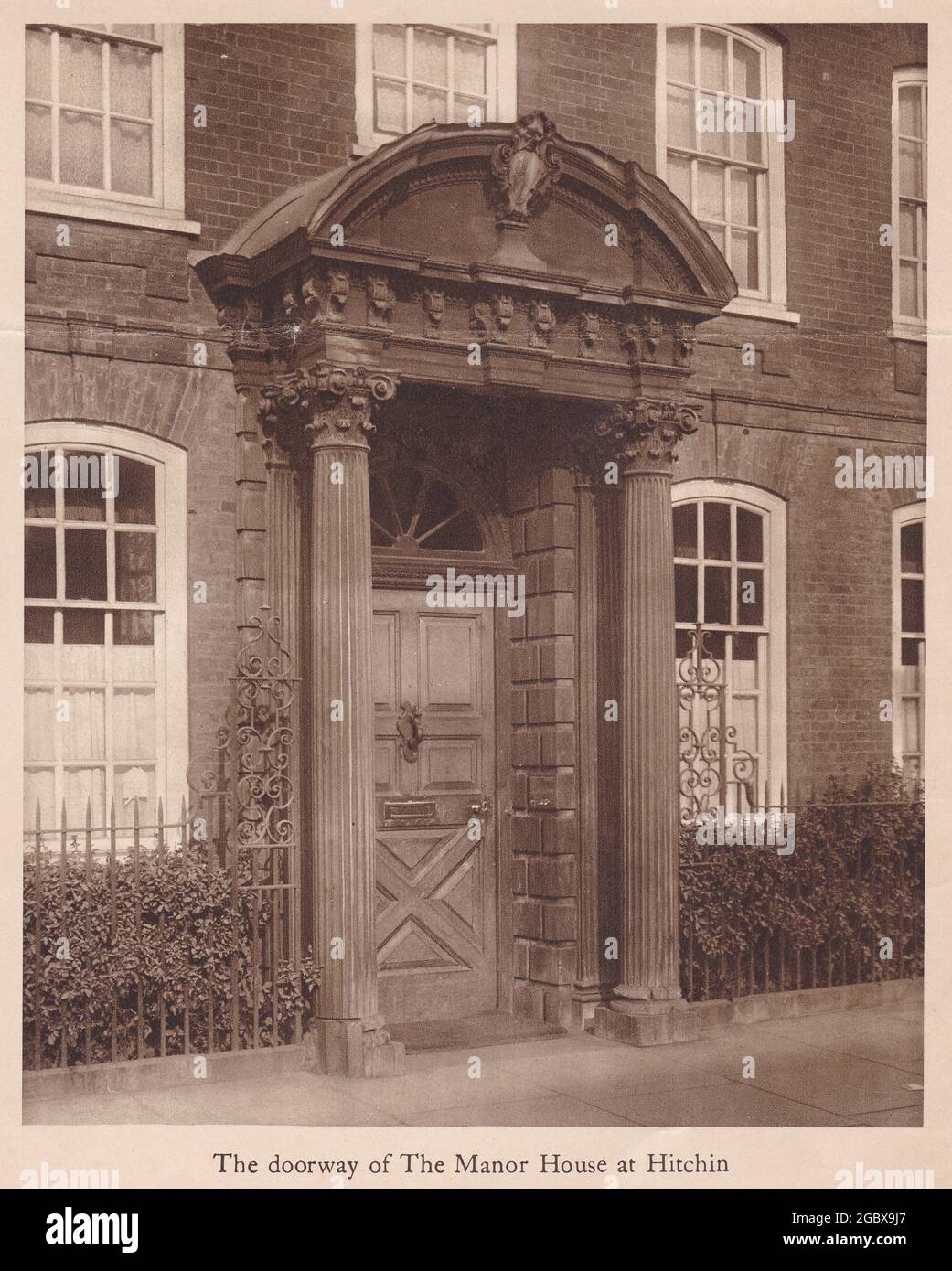 Vintage black and white photo of The Doorway of The Manor House at Hitchin 1950s? Stock Photo