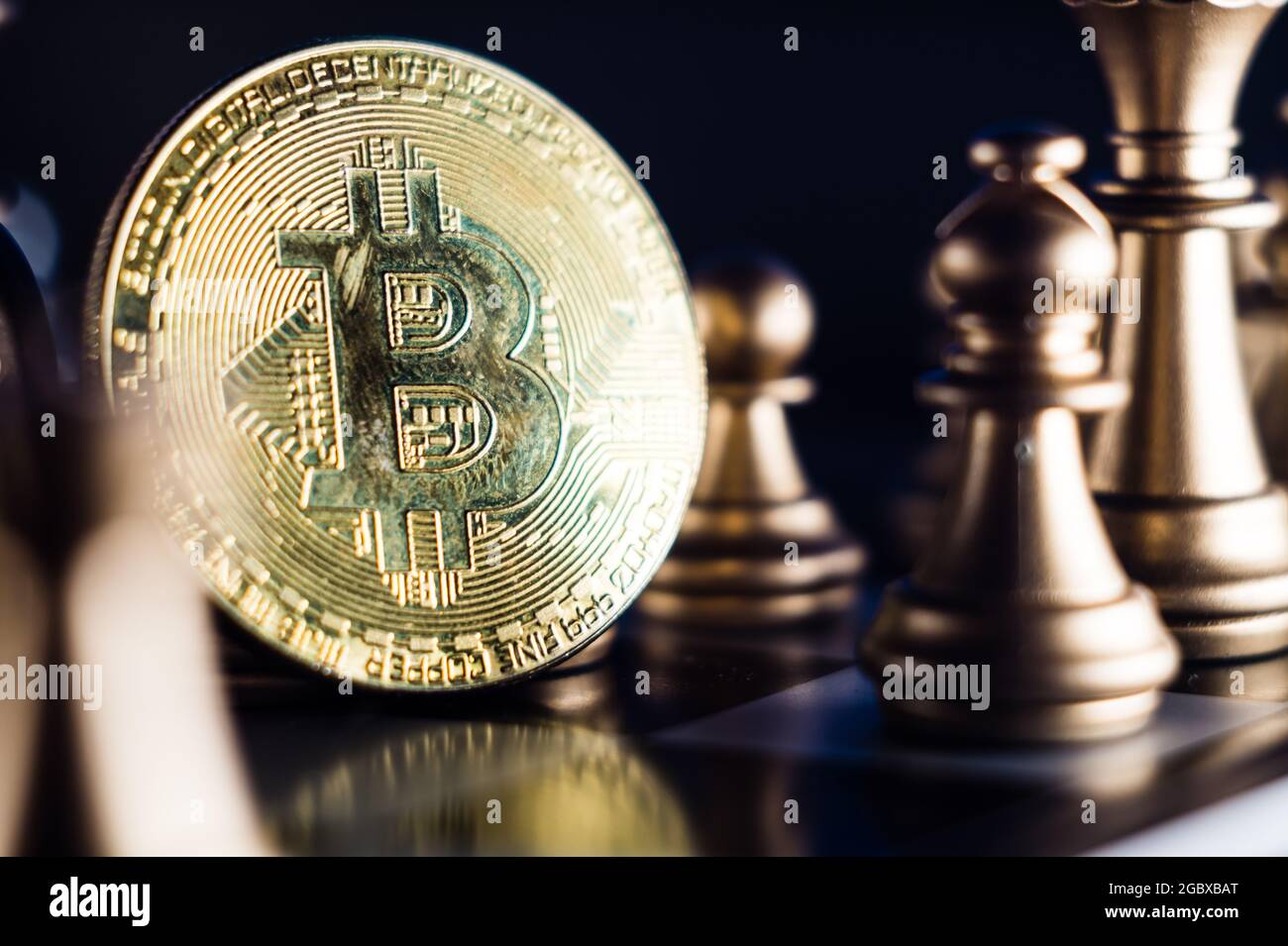 Closeup shot of a bitcoin on a chessboard with chess figurines around it  Stock Photo - Alamy