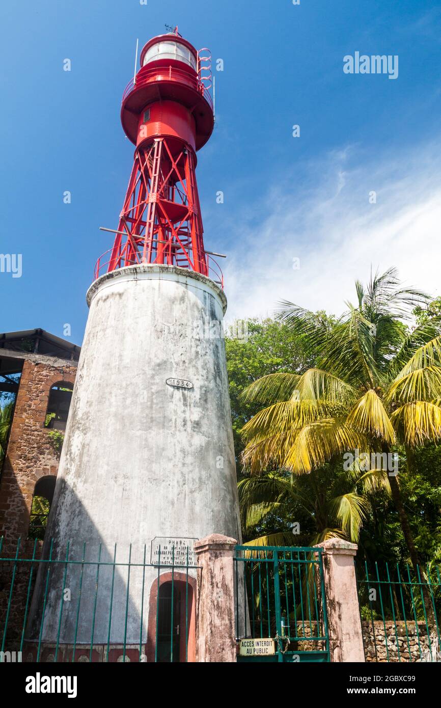 Lighthouse at a former penal colony at Ile Royale, one of the islands of Iles du Salut (Islands of Salvation) in French Guiana Stock Photo