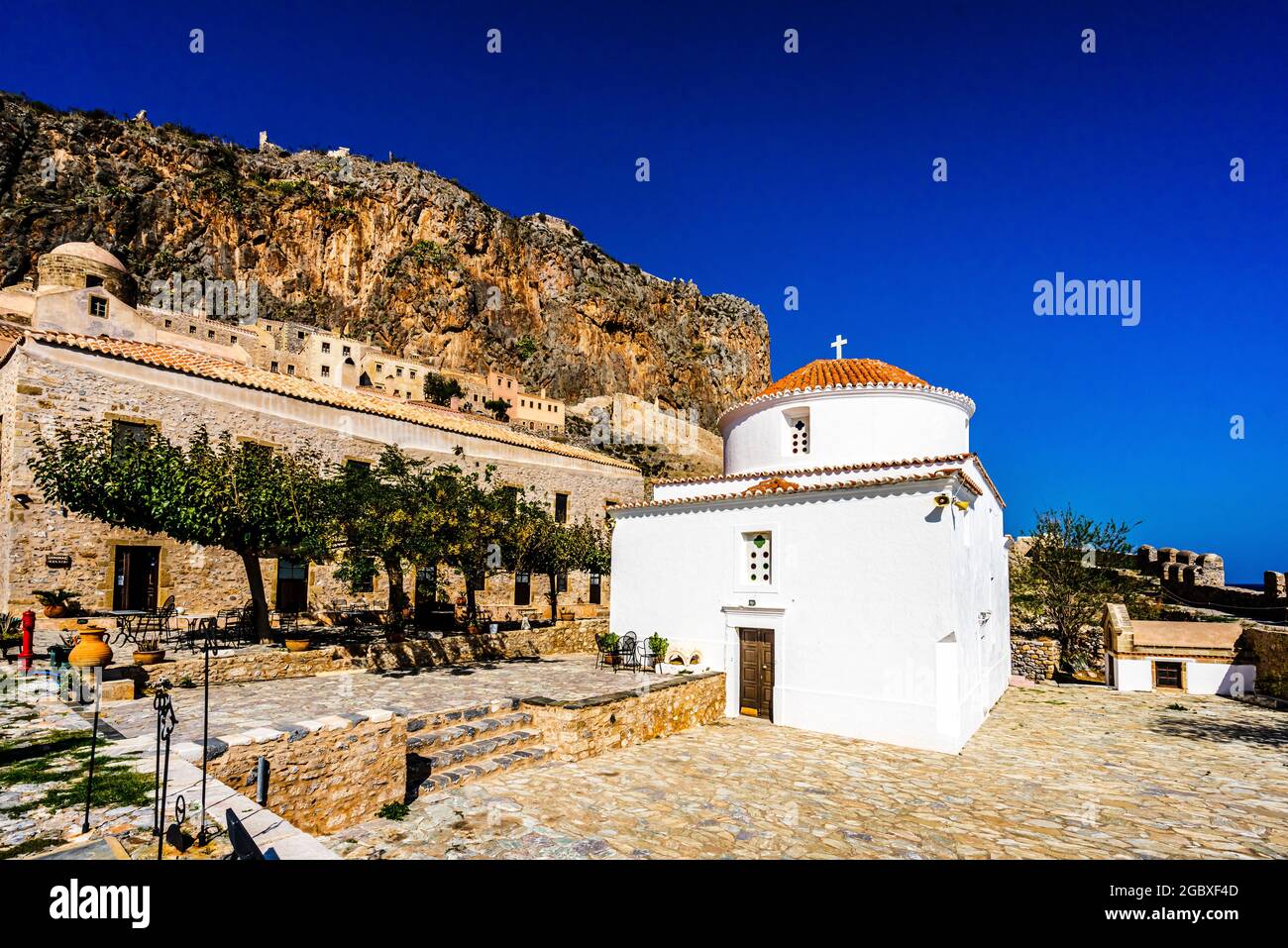 View on Monemvasia street panorama with old houses and Panagia