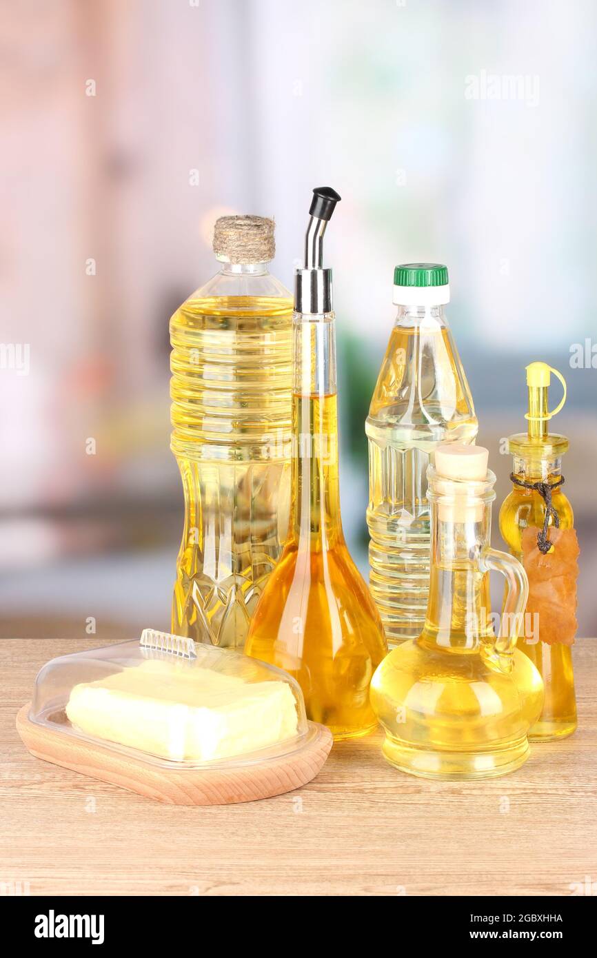 Different types of oil on table in kitchen Stock Photo - Alamy