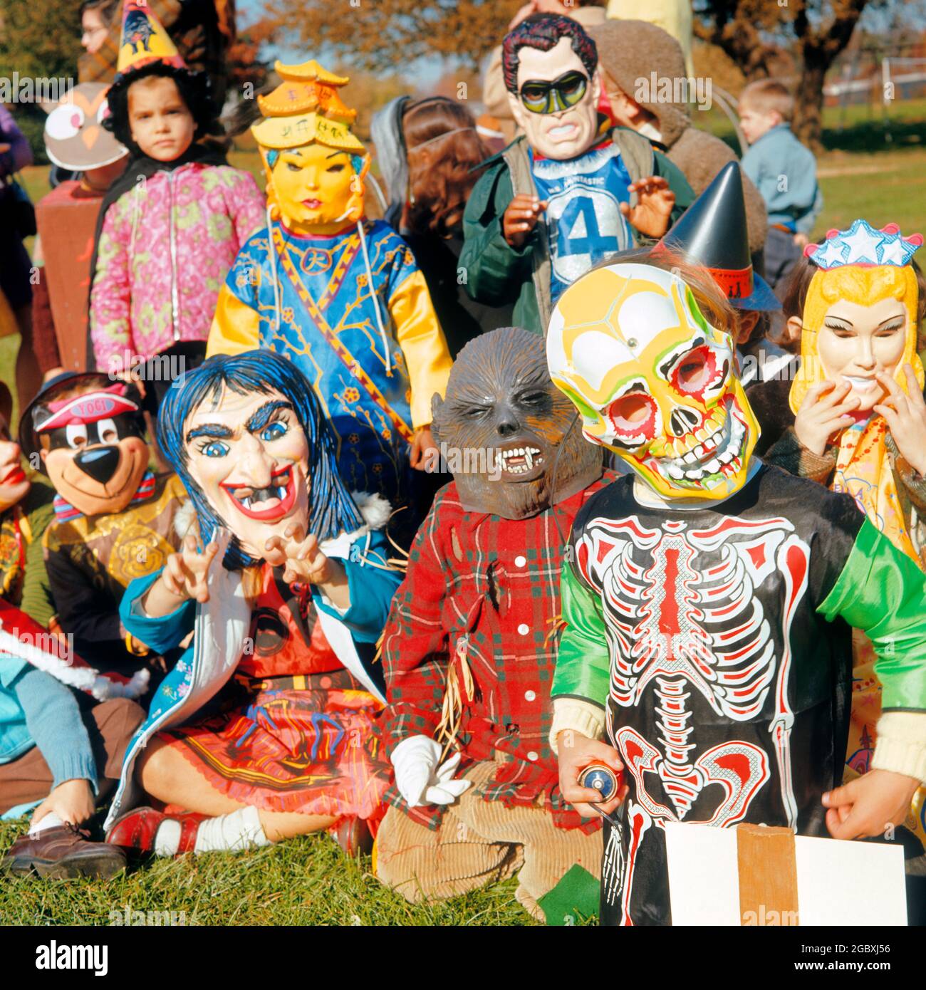1970s GROUP OF NEIGHBORHOOD KIDS BOYS AND GIRLS IN HALLOWEEN COSTUMES AND  MASKS - kh3213 HAR001 HARS WITCH NORTH AMERICA EYE CONTACT NORTH AMERICAN  SCARE NEIGHBORHOOD ADVENTURE AND CHARACTERS EXCITEMENT TRICK OR
