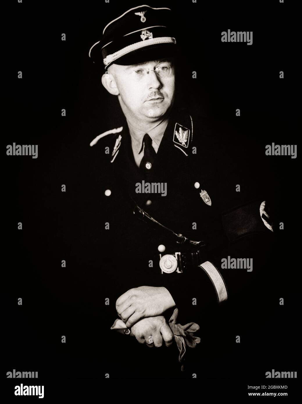 1930s 1940s PORTRAIT OF HEINRICH HIMMLER HEAD OF SS GESTAPO AND OVERSEER OF HOLOCAUST CONCENTRATION CAMPS NAZI WW2  - q72084 CPC001 HARS OCCUPATIONS UNIFORMS HOLOCAUST NAZI WORLD WAR 2 BRUTAL AMBITIOUS CAMPS MID-ADULT MID-ADULT MAN OVERSEER SHREWD SS SUICIDE ANTI-SEMITE ANTI-SEMITISM BLACK AND WHITE CAUCASIAN ETHNICITY CONCENTRATION DULL OLD FASHIONED Stock Photo
