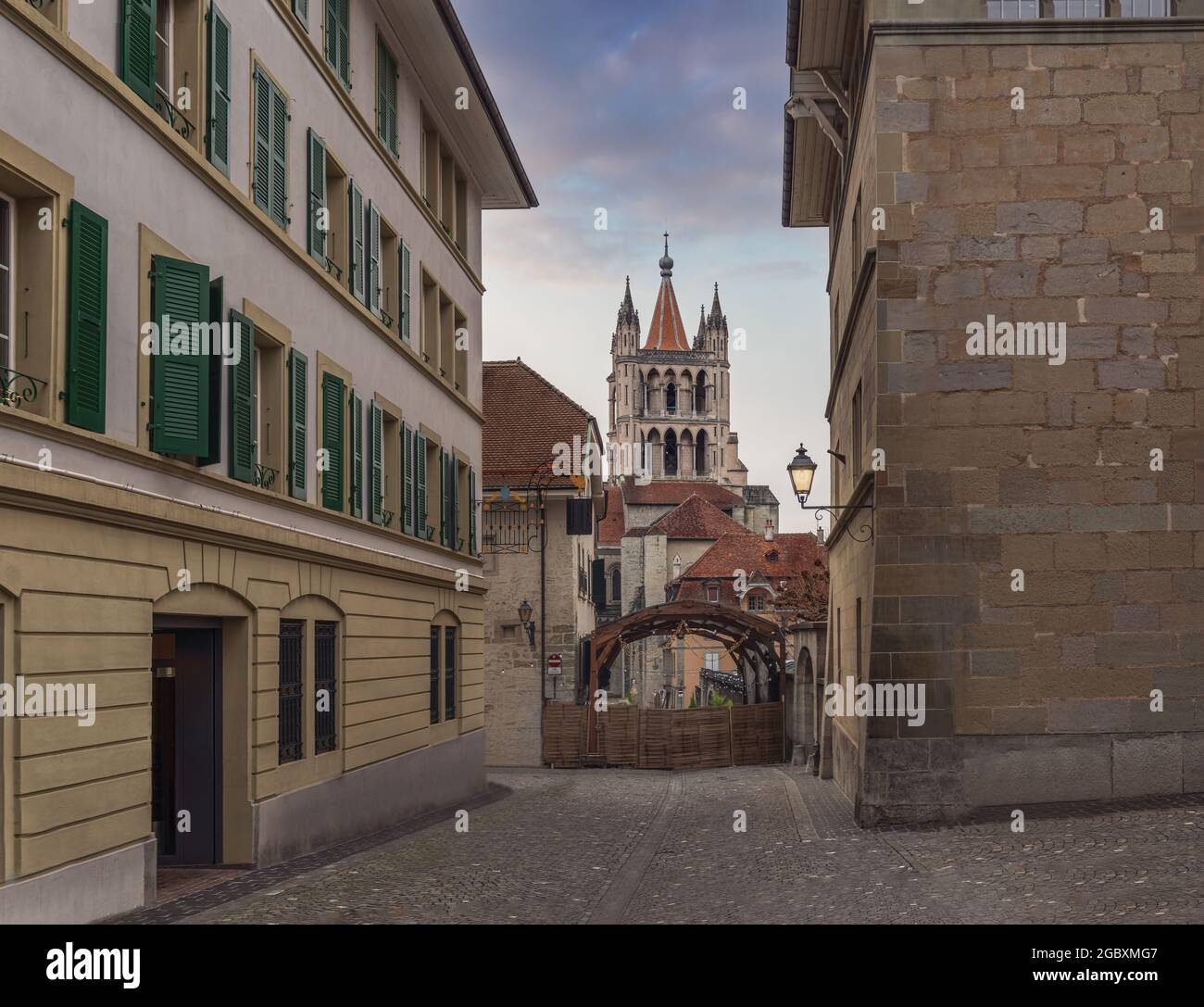 Cobblestone streets and Lausanne Cathedral - Lausanne, Switzerland Stock Photo