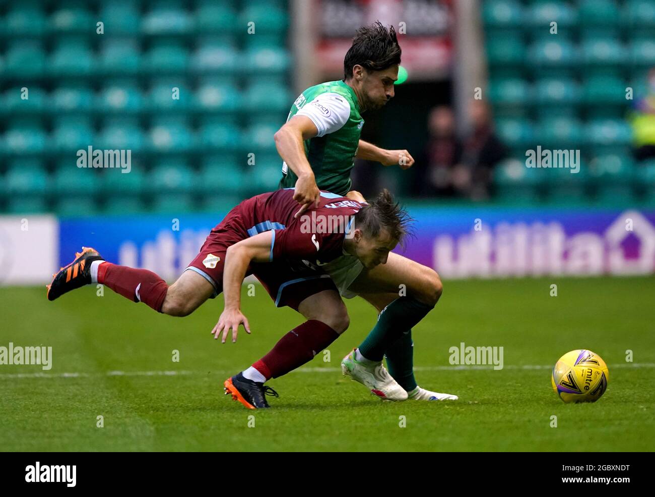 Hibernian's Joe Newell (right) and Rijeka's Adrian Liber battle for the ball during the UEFA Europa Conference League Third Qualifying Round, First Leg match at Easter Road Stadium, Edinburgh. Picture Date: Thursday August 5, 2021. Stock Photo