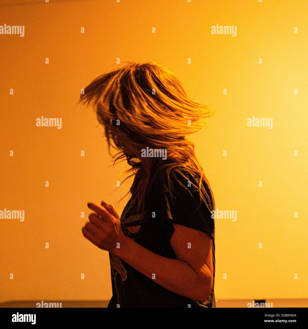 Blonde woman dancing hi-res stock photography and images - Alamy