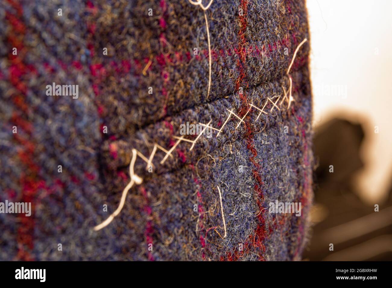 Bespoke suit pocket details in hebrides tweed fabric, menswear vintage style with dapper tweed Stock Photo
