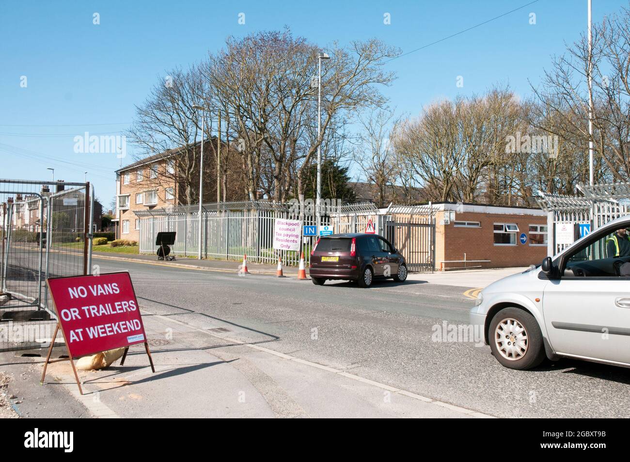 Sign outside household recycling centre during covid 19 informing no vans or trailers at weekend Blackpool Lancashire England United Kingdom Stock Photo