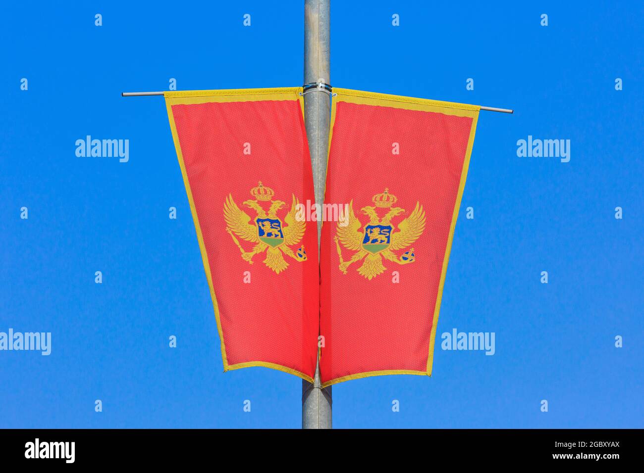 The national flag of Montenegro (since 13 July 2004) in Bar, Montenegro Stock Photo