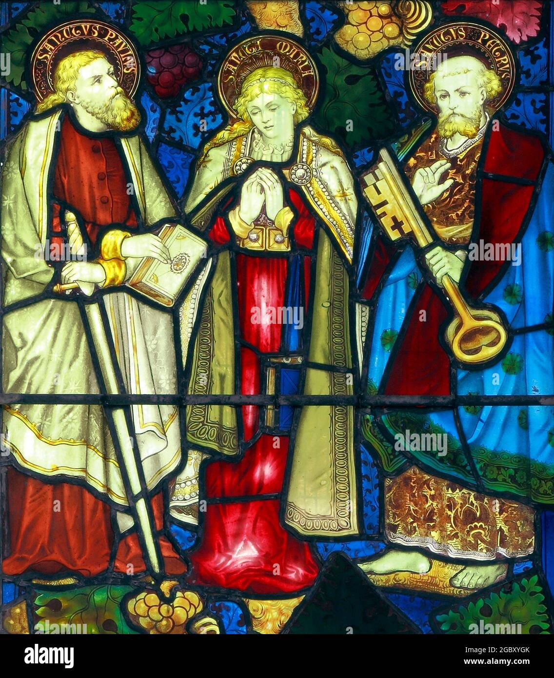 St. Paul, St. Mary, St. Peter, stained glass window, by Charles Kempe, 1879, Stanhoe, Norfolk, England Stock Photo