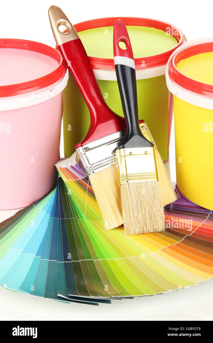 Set for painting paint pots, brushes, palette of colors close up Stock