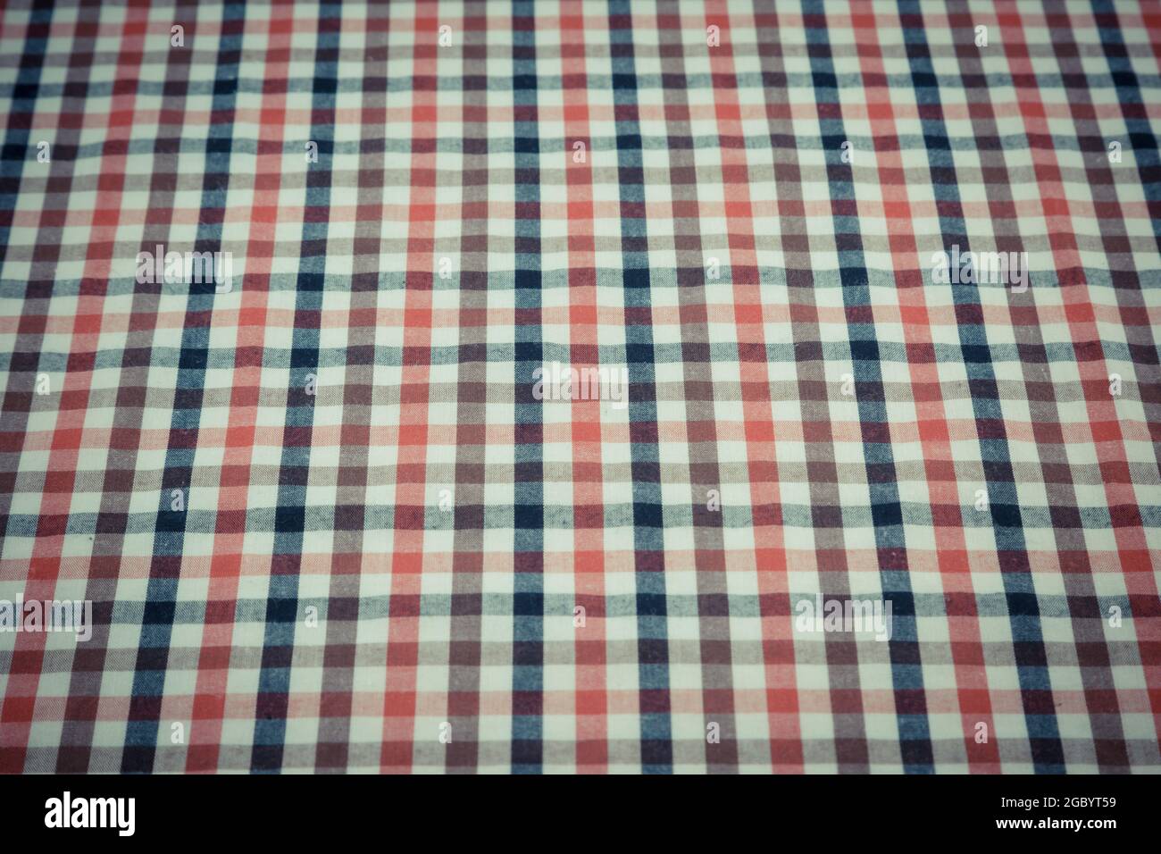 Texture and color of picnic tablecloth for wallpaper and background
