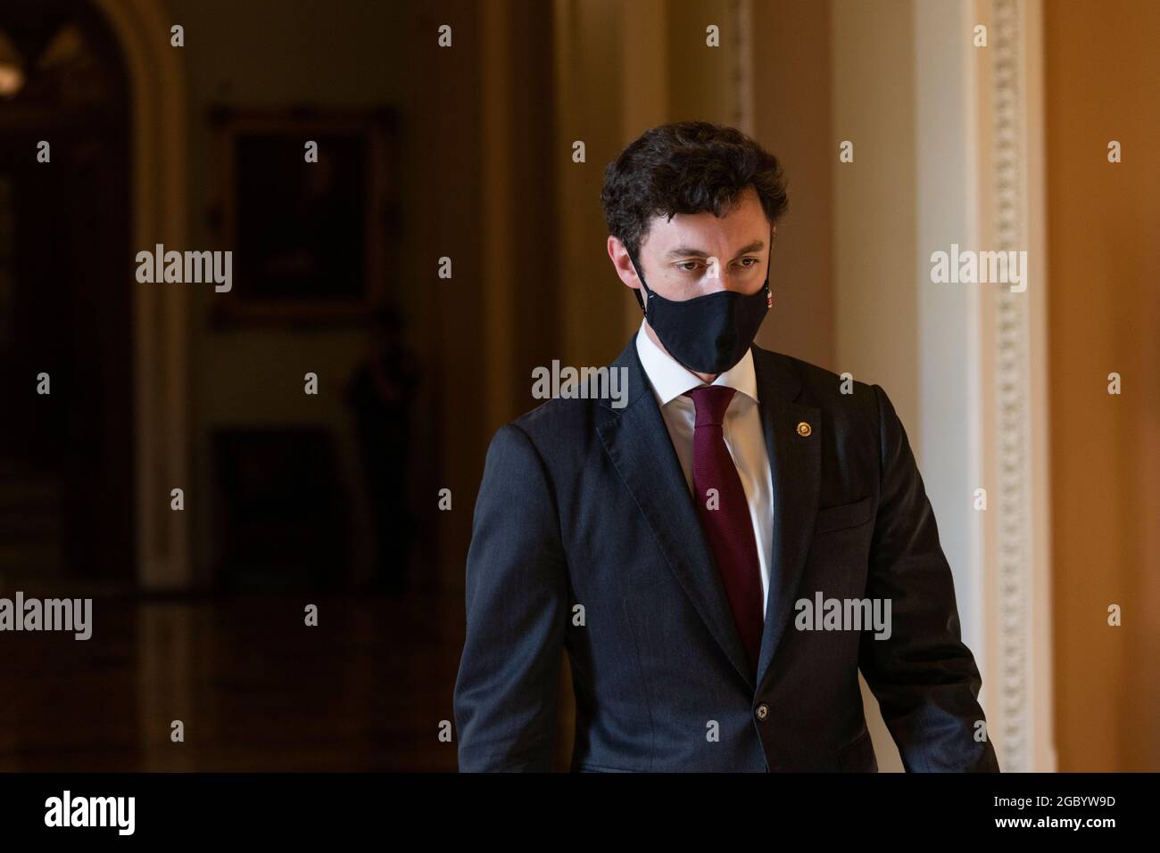 Washington, United States Of America. 05th Aug, 2021. United States Senator Jon Ossoff (Democrat of Georgia) leaves the Senate Chambers during negotiations on a bipartisan infrastructure bill on Capitol Hill in Washington, DC, U.S. on August 5, 2021. Credit: Aaron Schwartz/CNP/Sipa USA Credit: Sipa USA/Alamy Live News Stock Photo