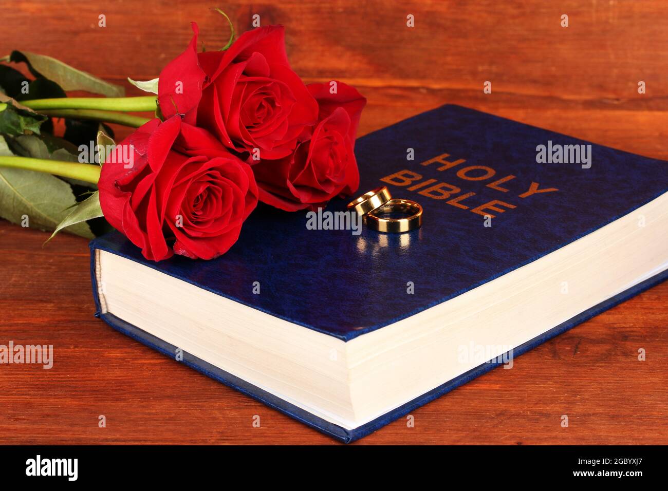 Wedding Rings Bible Cross Flowers High Resolution Stock Photography and