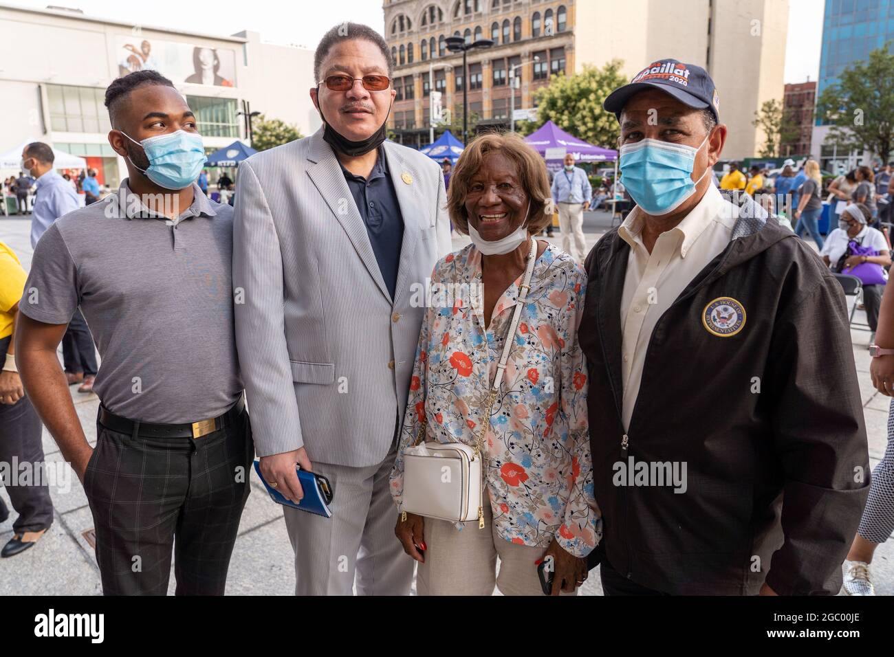 New York, USA. 3rd Aug, 2021. Activist Hazel Dukes (2nd from Right) and U. S. Representative Adriano Espaillat (Right) attend the National night out against gun violence in Harlem, New York City.Various organization joined police community affairs officers to drive a message against gun violence on streets of the city. There were services to help youth to get decent paying jobs, medical tents to get tested for HIV and COVID-19, COVID-19 vaccination popup, and free food offering. (Credit Image: © Ron Adar/SOPA Images via ZUMA Press Wire) Stock Photo