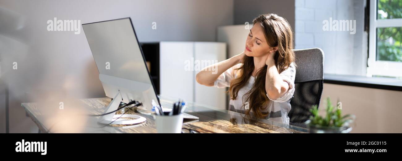 Bad Posture Neck Pain At Office Computer Stock Photo