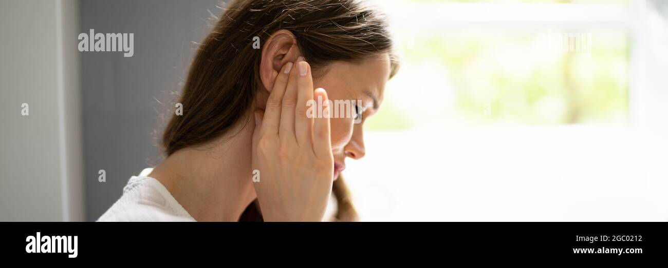 Hearing Aid And Painful Ear Ache. Hearing Issue Stock Photo Alamy