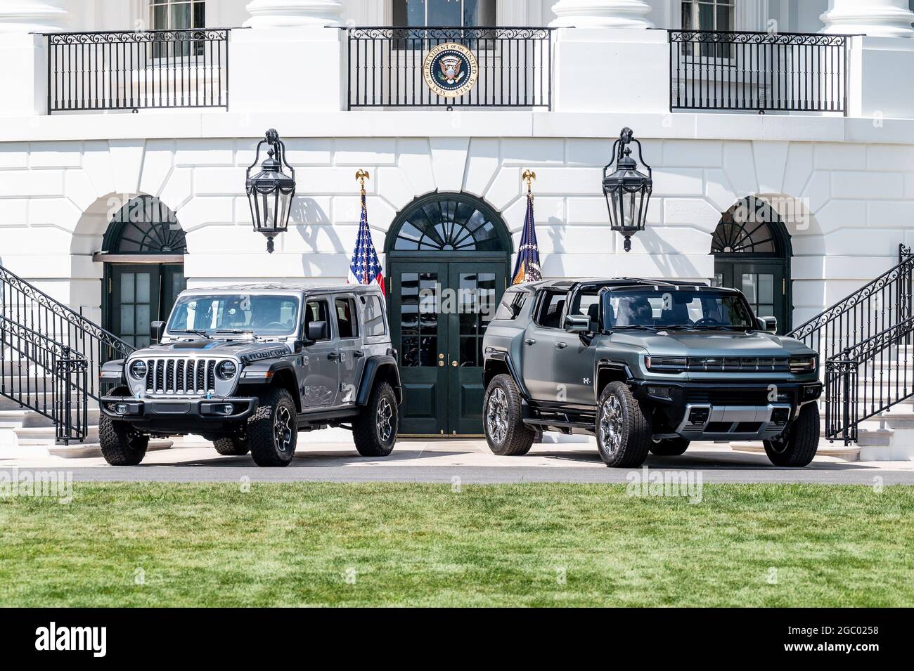 Washington, United States. 05th Aug, 2021. A Jeep Wrangler Limited Rubicon  4xE and a GMC Hummer EV are parked in front of the South Portico of the  White House at an event