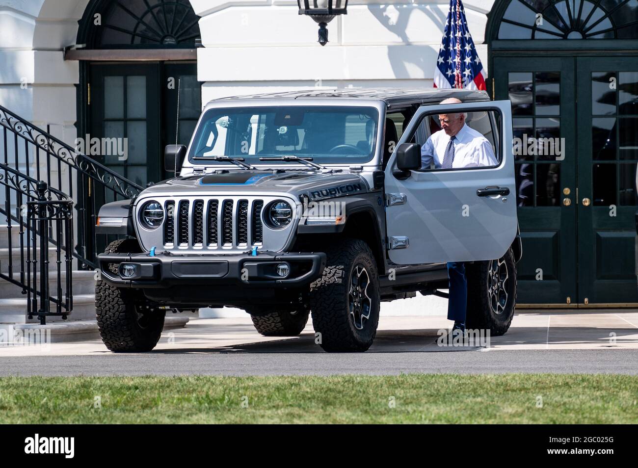 Washington, United States. 05th Aug, 2021. President Joe Biden gets into a  Jeep Wrangler Limited Rubicon 4xE parked in front of the South Portico of  the White House at an event where