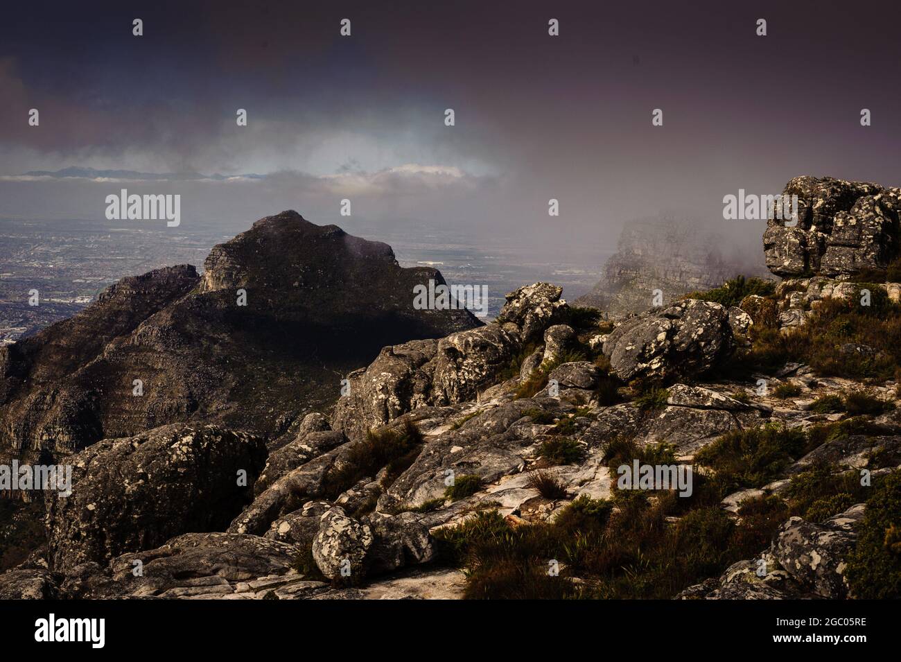 Devil's Peak is seen from Cape Town's landmark Table Mountain during the southern hemisphere's winter months in South Africa Stock Photo