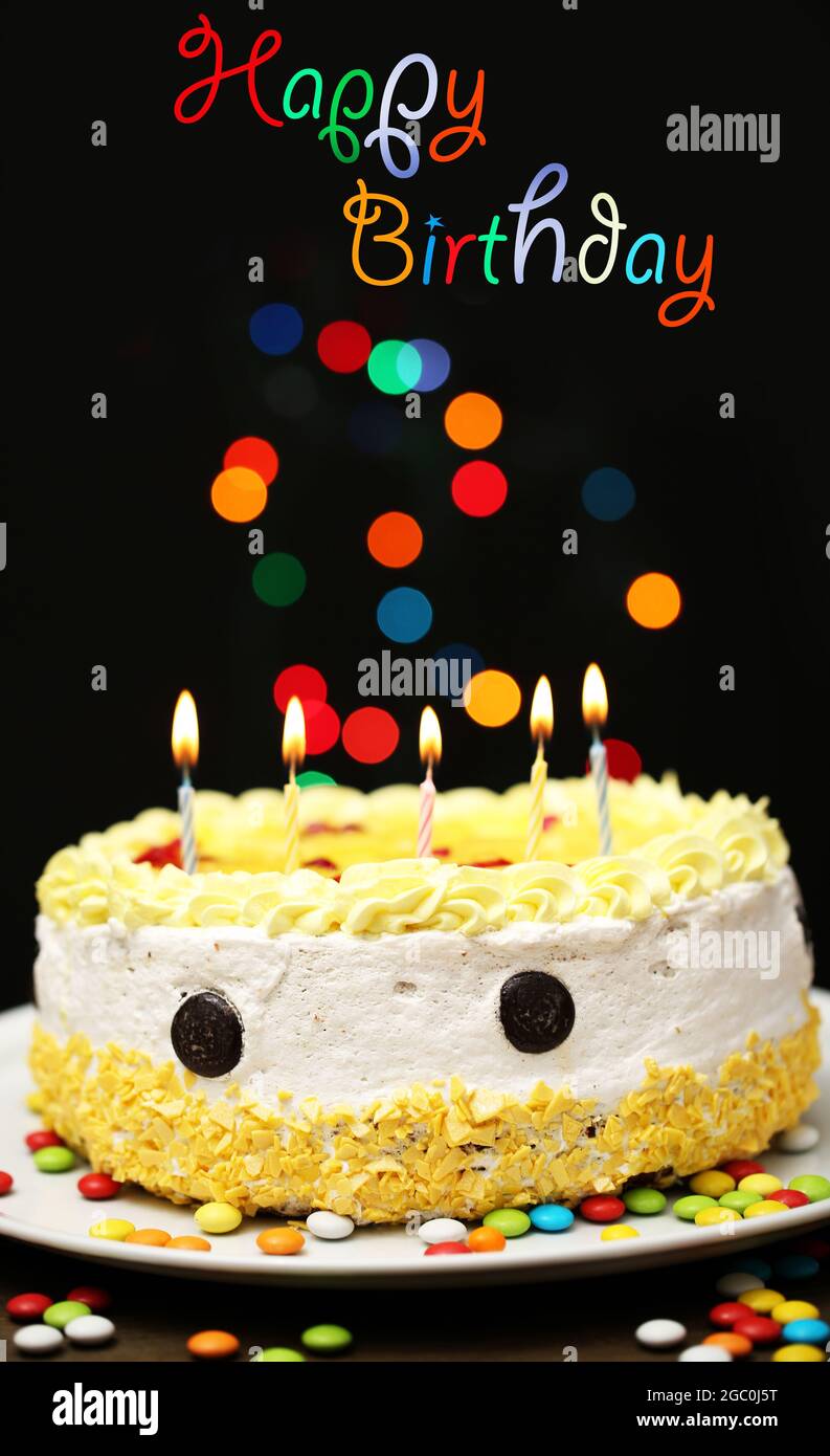 Happy birthday cake, on black background Stock Photo Alamy