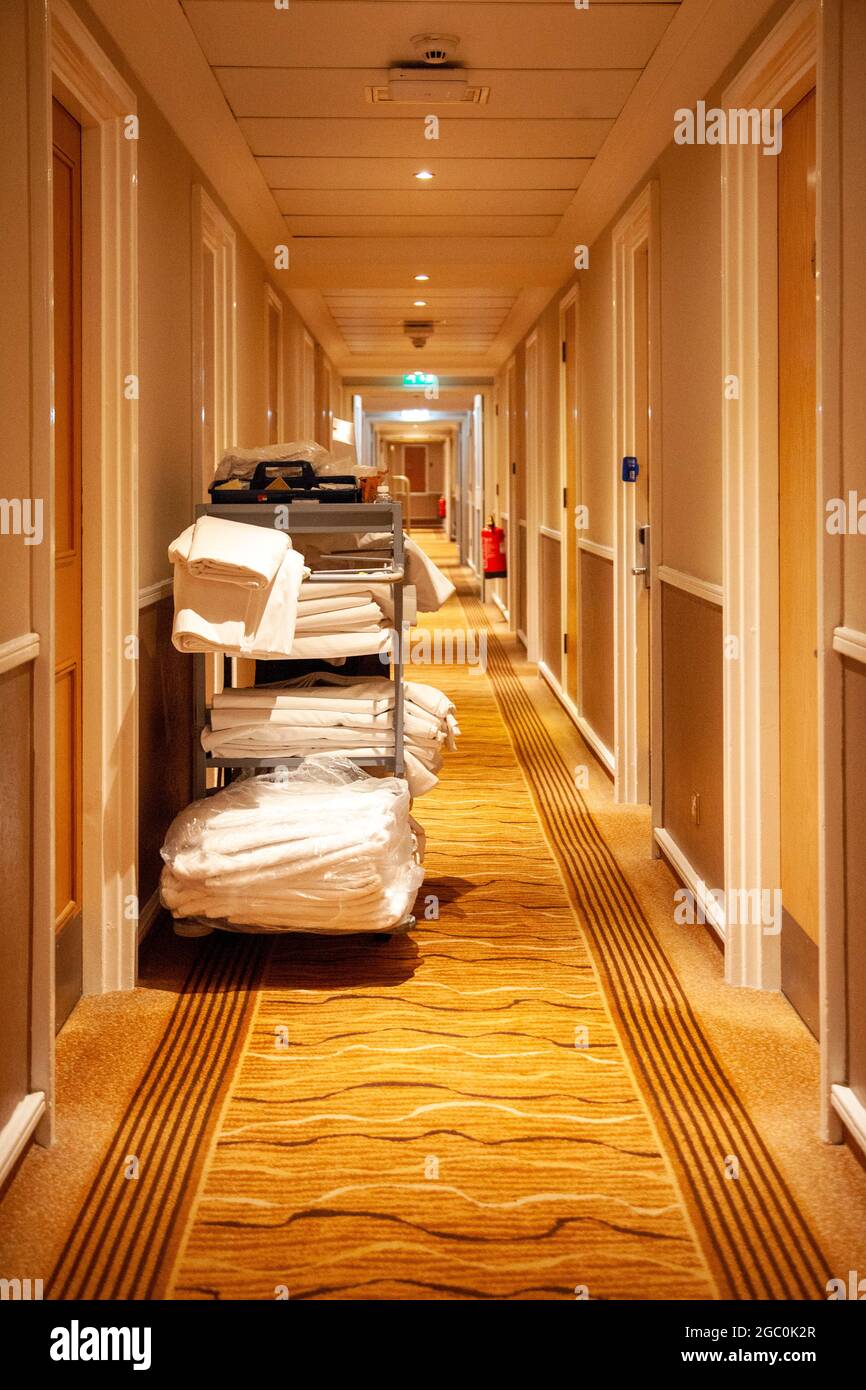 Housekeeping Trolley in Hotel Corridor Stock Photo
