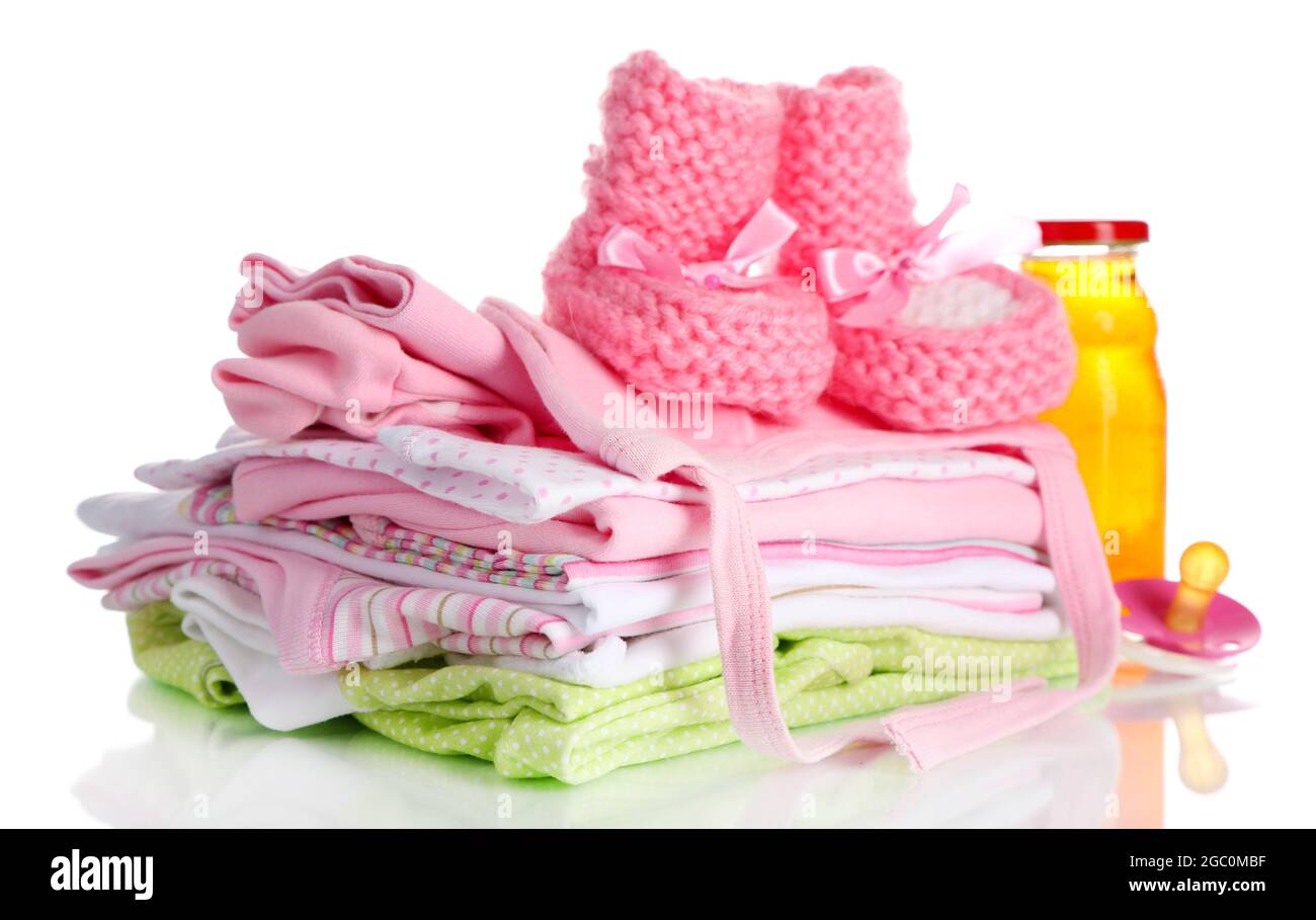 Pile of baby clothes isolated on white Stock Photo Alamy