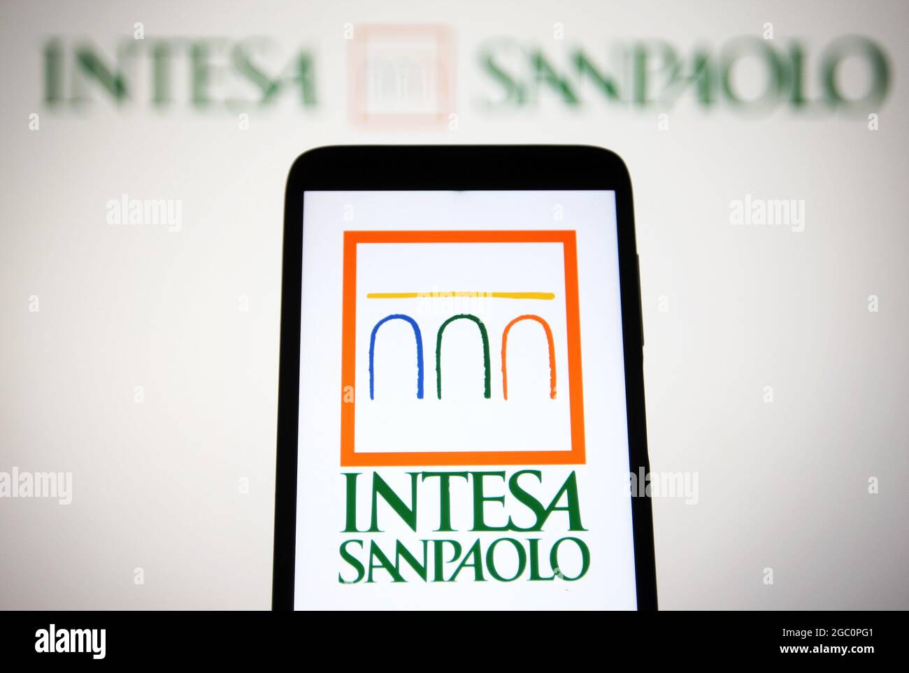 Ukraine. 06th Aug, 2021. In this photo illustration an Intesa Sanpaolo  S.p.A. logo of an Italian international banking group is seen on a  smartphone and a pc screen. (Photo by Pavlo Gonchar/SOPA