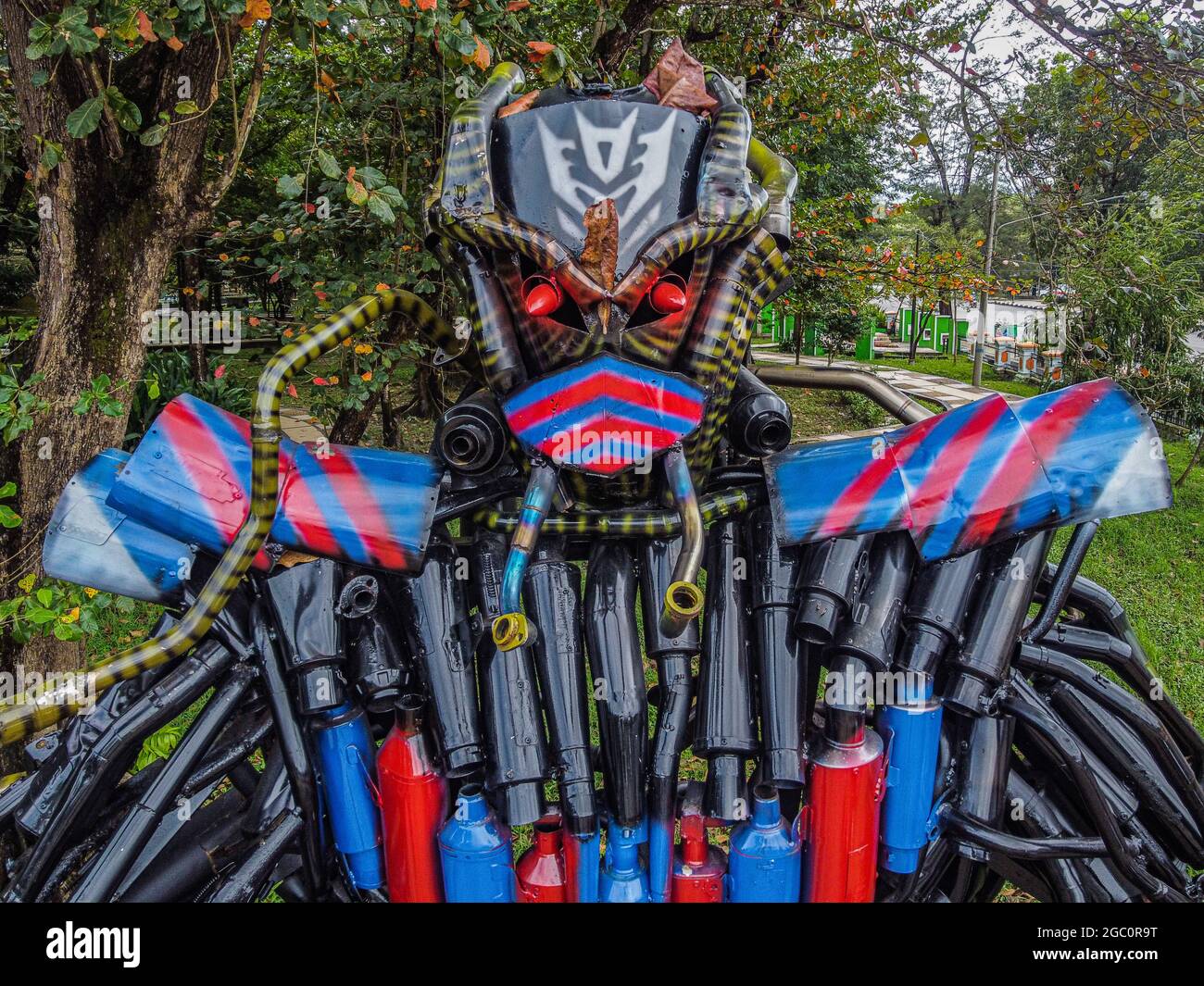 Kendari, Indonesia. 06th Aug, 2021. Antravi robot made by the Kendari Police Traffic Unit from a bogar exhaust confiscated by traffic violations. The Kendari City Traffic Police Unit has innovated to create a robot that resembles a transformer made from racing exhaust confiscated from motorists who annoy other road users because of the noise sound. The robot is named 'ANTRAVI' or stands for Anti Traffic Violation. Credit: SOPA Images Limited/Alamy Live News Stock Photo