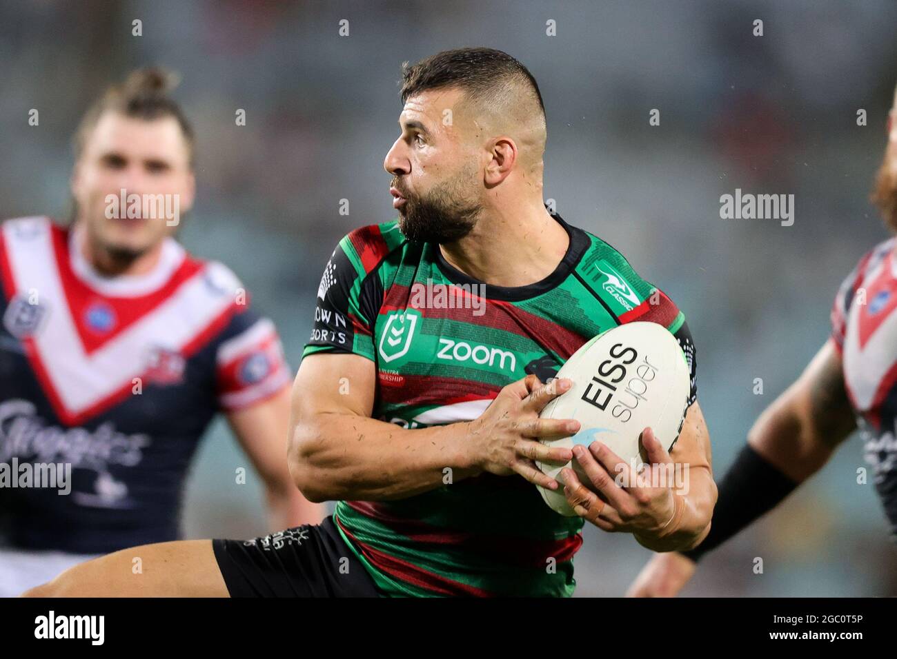 SYDNEY, AUSTRALIA - MARCH 26: Josh Mansour of the Rabbitohs jumps and  catches the ball during the round three NRL match between the South Sydney  Rabbitohs and Sydney Roosters at Stadium Australia