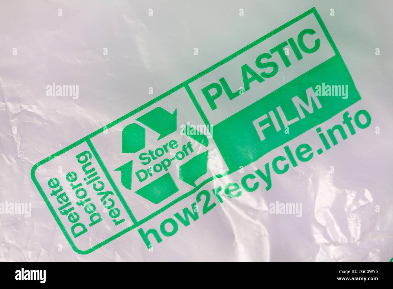 deflate before recycling with recycle logo recycling logo Mobius Loop symbol store drop off on plastic film packaging Stock Photo