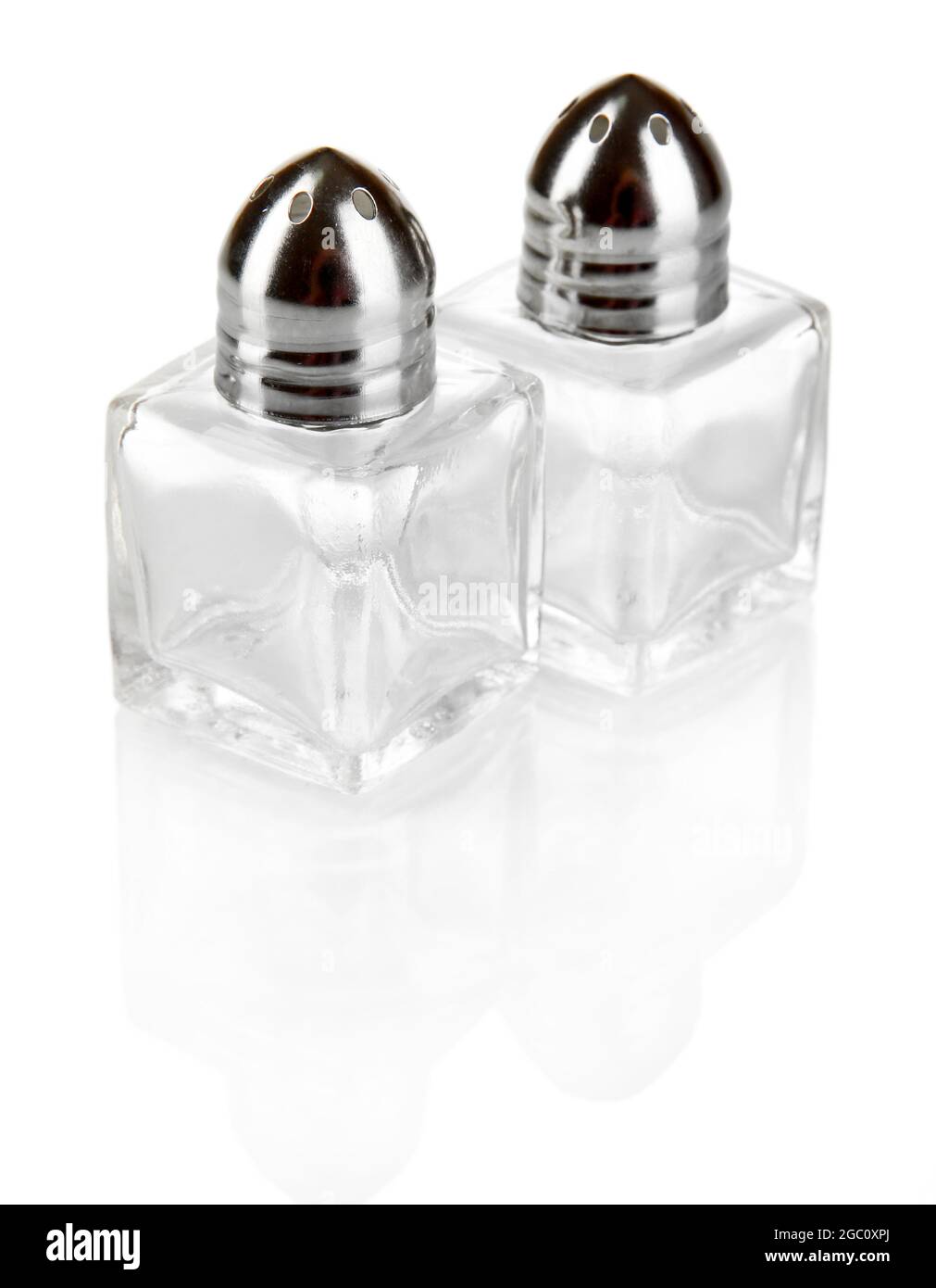 Containers for salt and pepper isolated on white Stock Photo Alamy