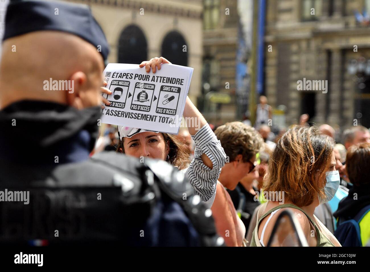People gather to demonstrate against the French Health Pass outside the French Constitutional Council as it deliberates on the new law requiring compulsory vaccination for some professions and proof of vaccination or negative Covid-19 test to access some public spaces. Paris, France on August 5, 2021. Photo by Karim Ait Adjedjou/Avenir Pictures/ABACAPRESS.COM Stock Photo