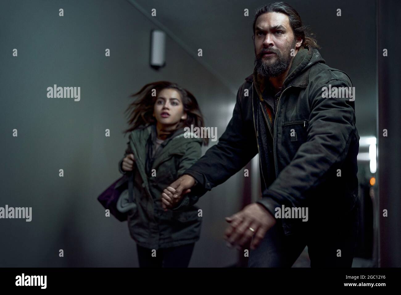 JASON MOMOA and ISABELA MERCED in SWEET GIRL (2021), directed by 