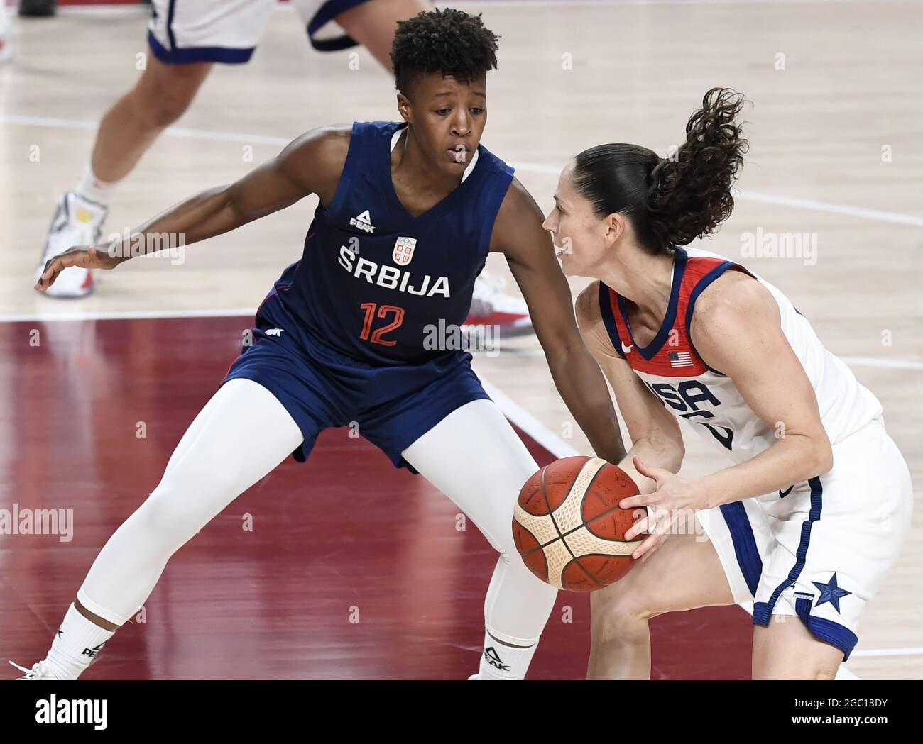 Tokyo, Japan. 06th Aug, 2021. United States' Sue Bird (R) moves into the lane as Serbia's Yvonne Anderson defends during the Women's Basketball semifinal at the Tokyo 2020 Olympics, Friday, August 6, 2021, in Tokyo, Japan. USA won, 70-59 to advance to the Gold Medal game. Photo by Mike Theiler/UPI Credit: UPI/Alamy Live News Stock Photo