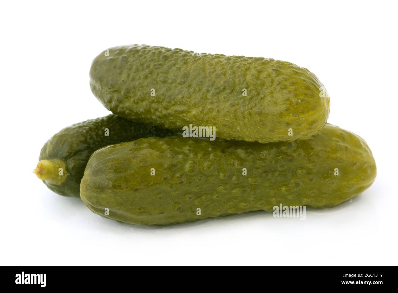 Three pickled cucumbers isolated on white background Stock Photo