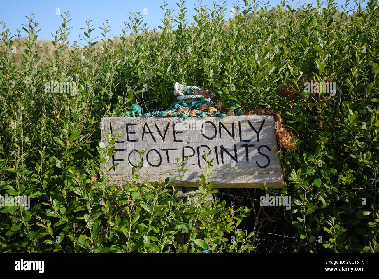 Leave Only Footprints sign Stock Photo