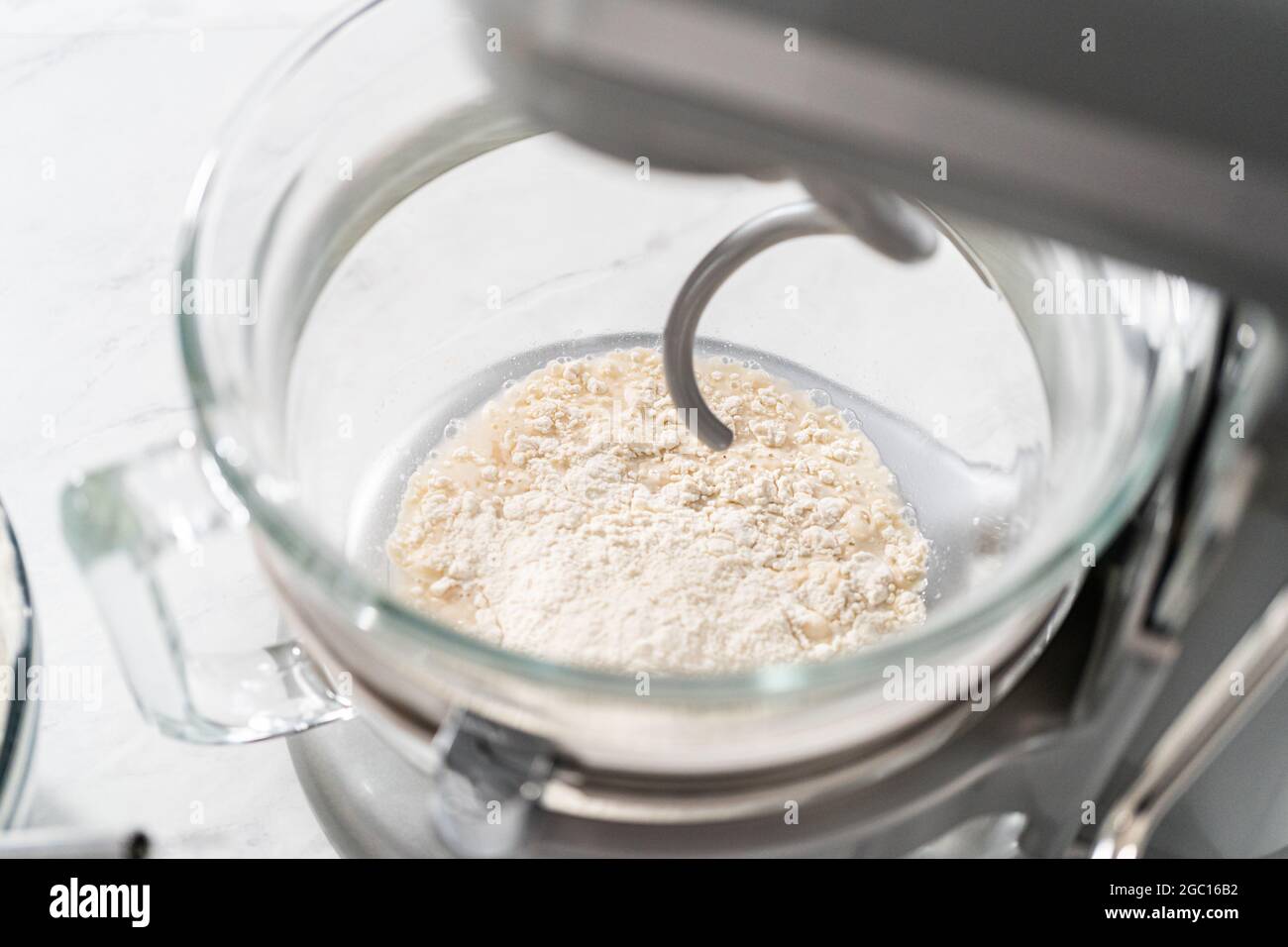 Mixing bread dough in a standalone kitchen mixer to bake patriotic