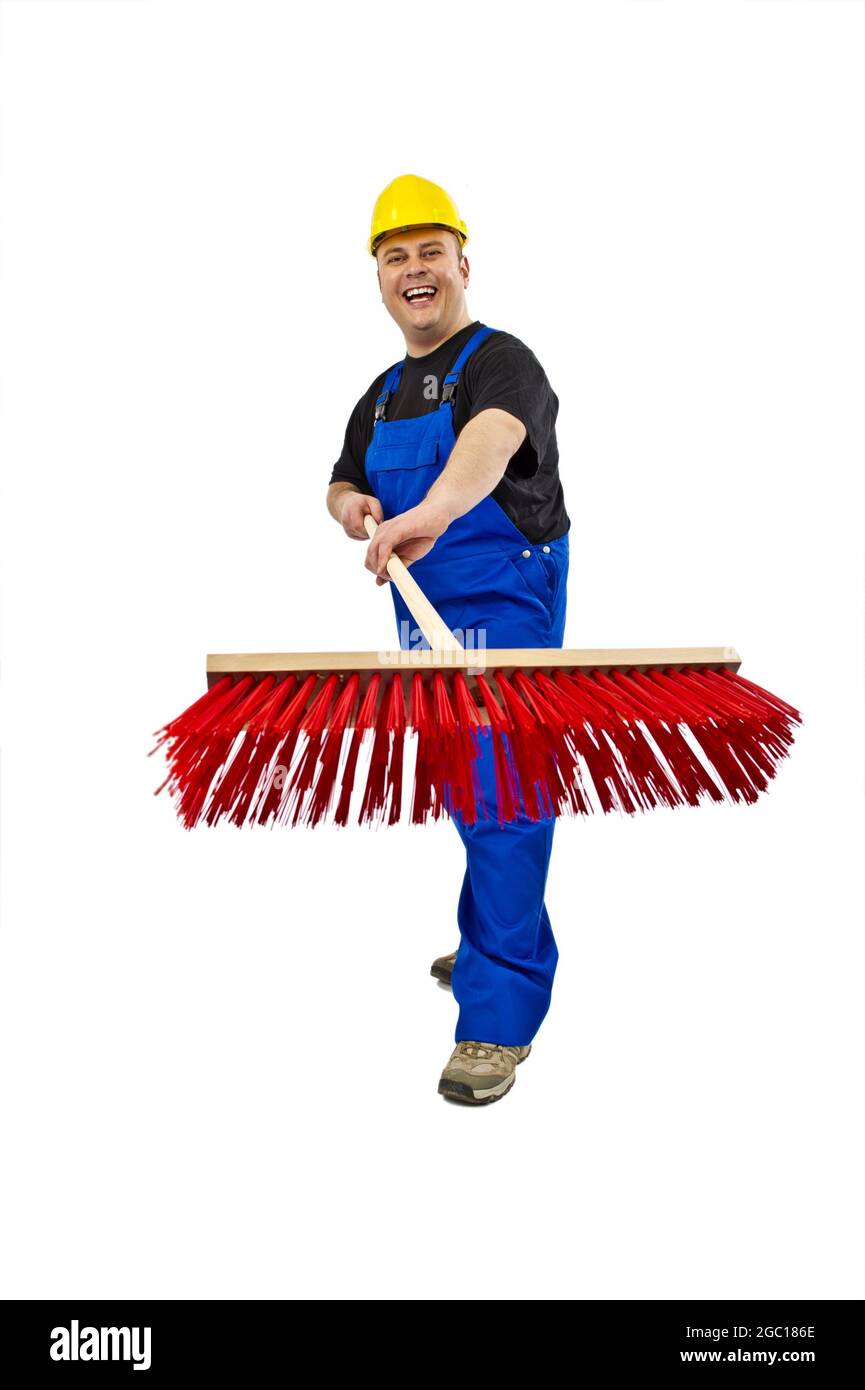 blue collar worker with yard brush Stock Photo
