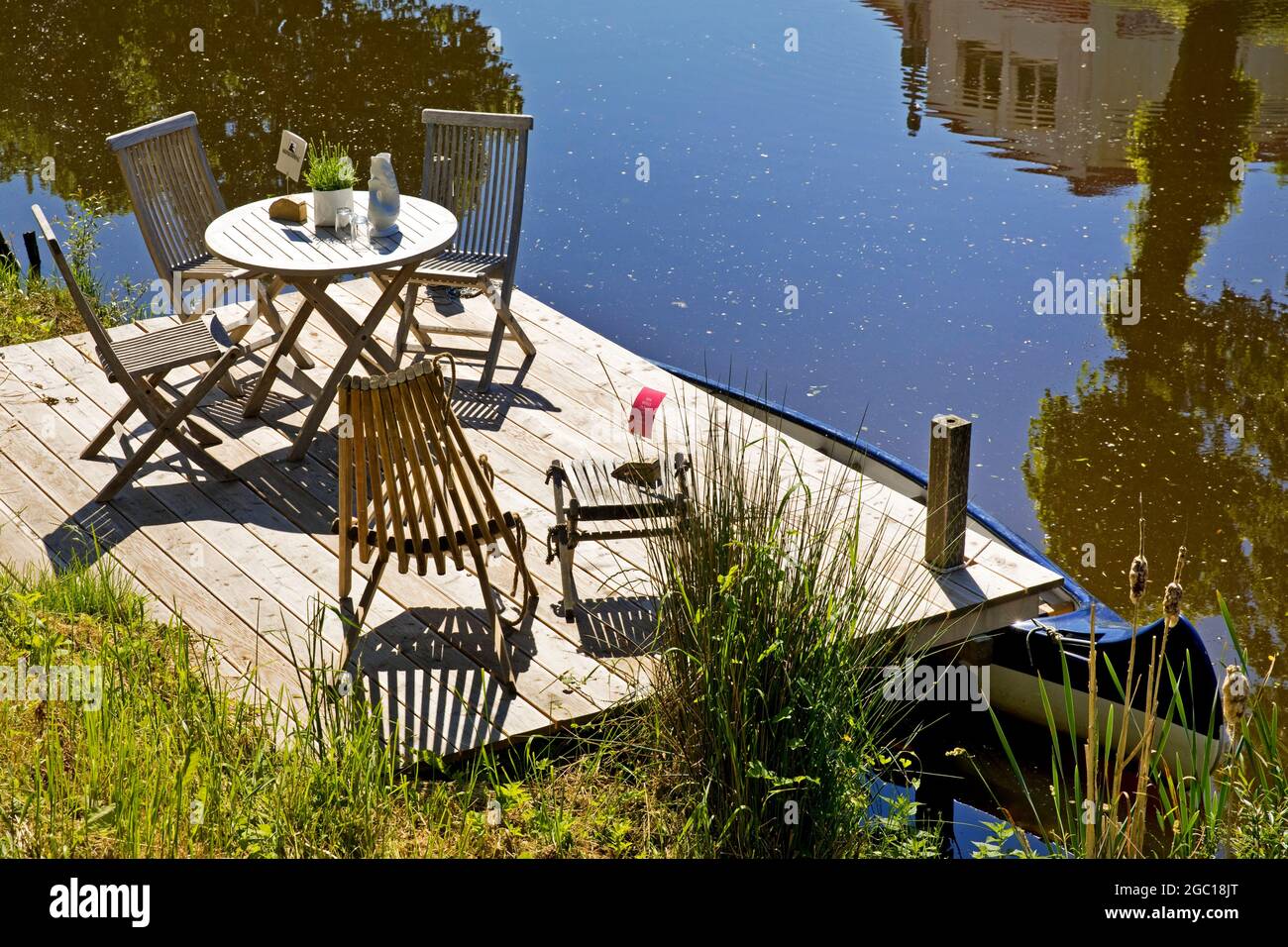 resting place by a canal, Germany, Schleswig-Holstein, Northern Frisia, Friedrichstadt Stock Photo