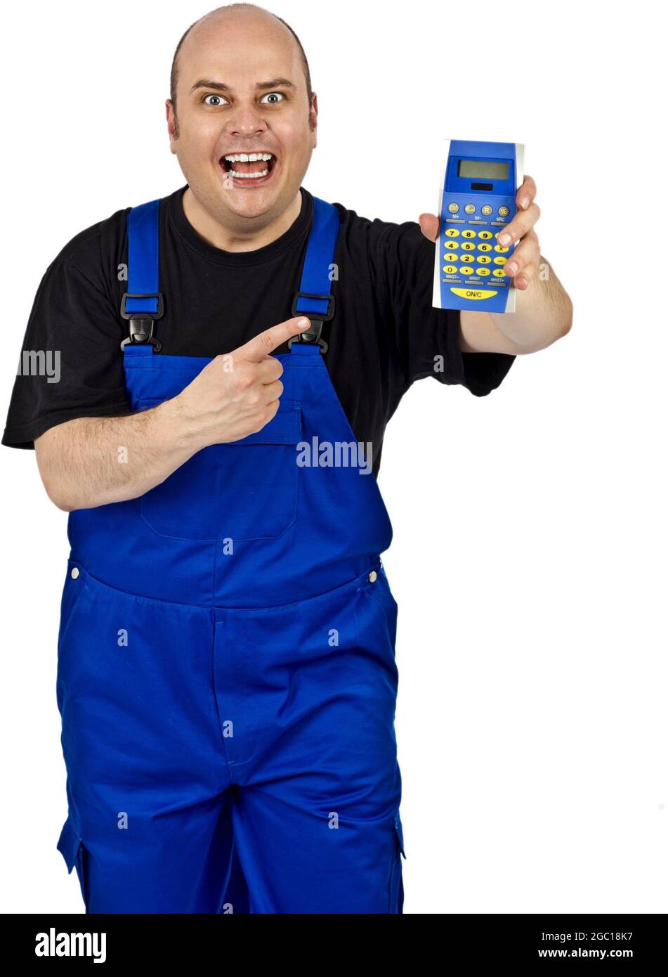 construction worker in blue dungarees enthusiastically pointing to a pocket calculator Stock Photo