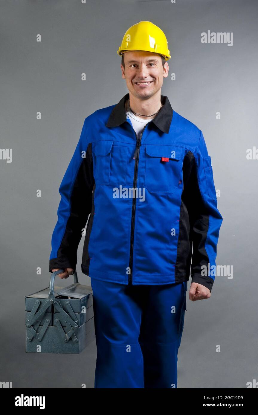 blue collar worker with toolbox Stock Photo