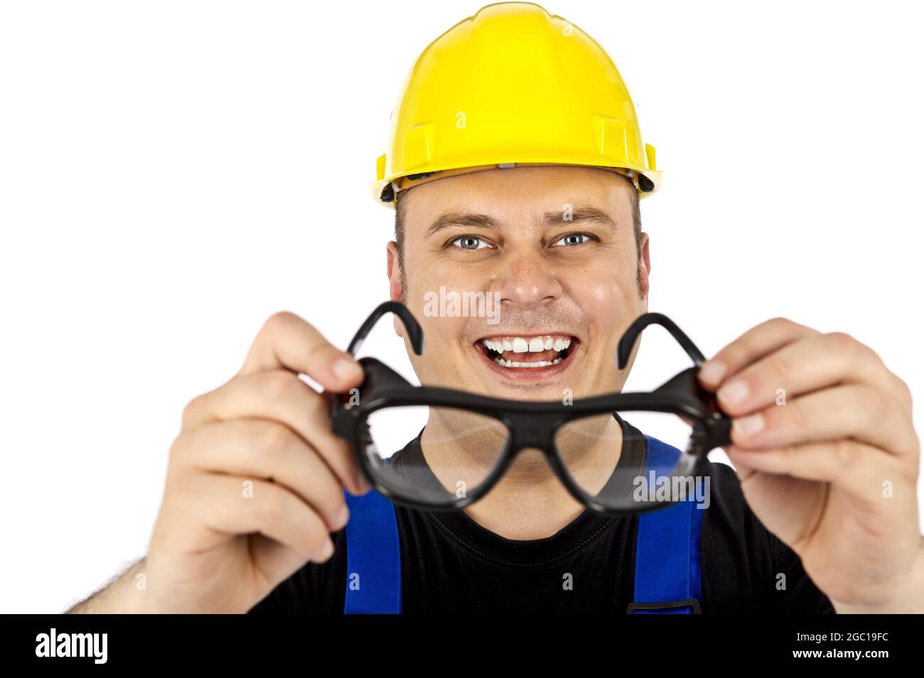 blue collar worker with hard hat and safety glasses Stock Photo - Alamy