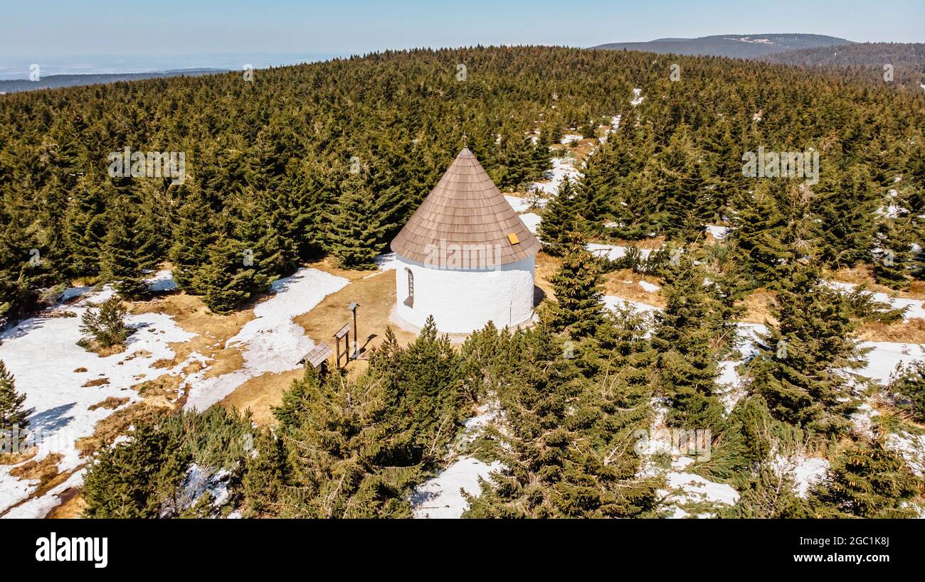 Aerial view of baroque Chapel of the Visitation of Virgin Mary,Kunstat Chapel located in forest of Eagle Mountains,Czech Republic.Circular floor Stock Photo