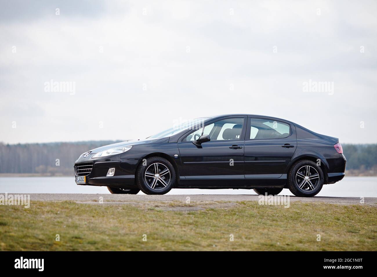 Berlin - April 2014: Peugeot 407 2003-2010 sedan pre facelift side view on  road outdoors over spring landscape background with lake and forest with  Stock Photo - Alamy