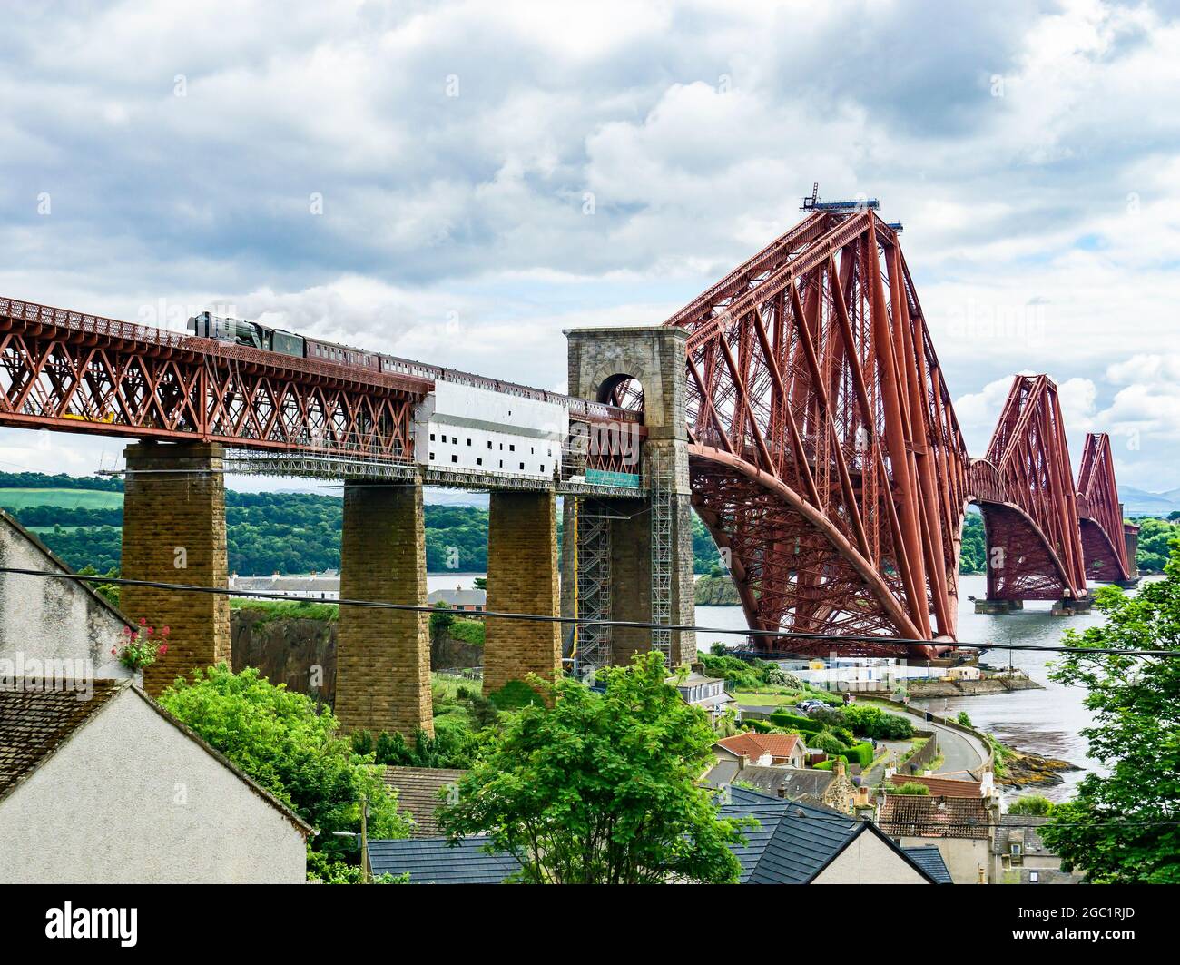 The A1 Steam Locomotive Trust Peppercorn 60163 Tornado heads an excursion across the Forth Bridge on a tour round the Fife Circle in Scotland UK Stock Photo