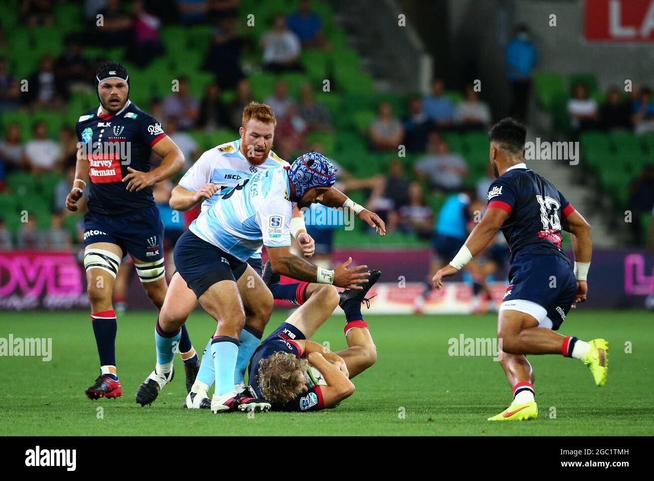 MELBOURNE, AUSTRALIA - MARCH 19: Joe Powell of the Melbourne Rebels gets tackled during the round 5 Super Rugby match between the Melbourne Rebels and NSW Waratahs at AAMI Park on March 19, 2021 in Melbourne, Australia.  Credit: Dave Hewison/Speed Media/Alamy Live News Stock Photo