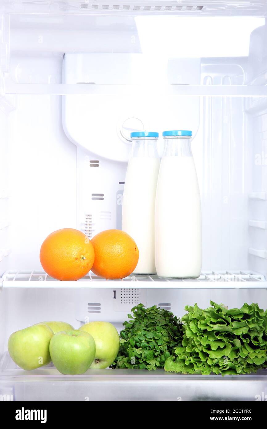 Open refrigerator with vegetarian food Stock Photo Alamy