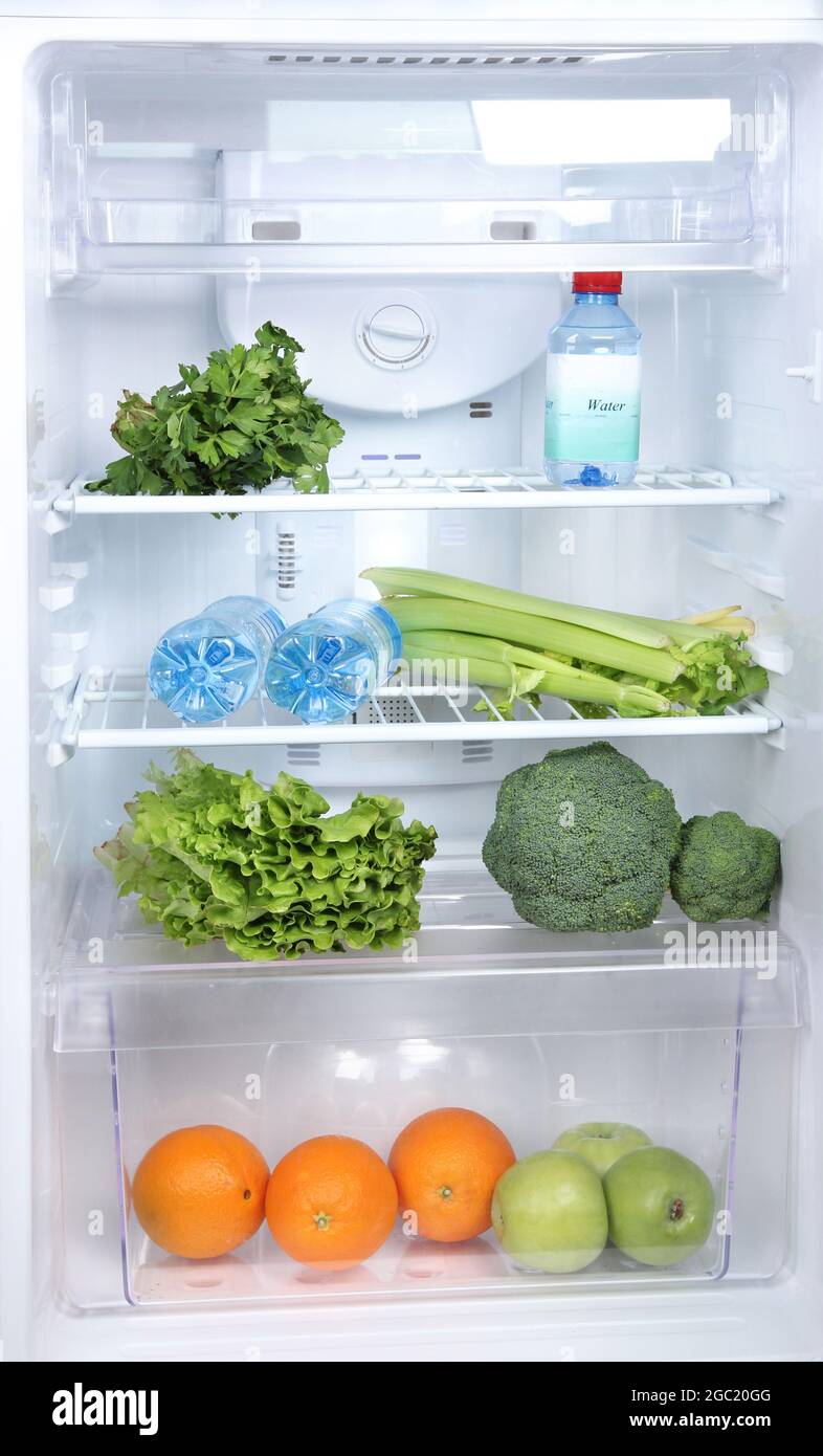 Open refrigerator with vegetarian food Stock Photo Alamy